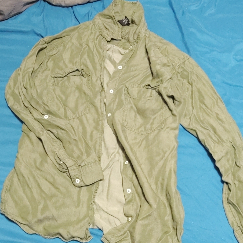 Green button up shirt
